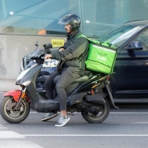 food delivery, courier, motorcycle, waiting, traffic, transport, delivery, street, road, city, urban, man, job, helmet, box, snapshot, street photography